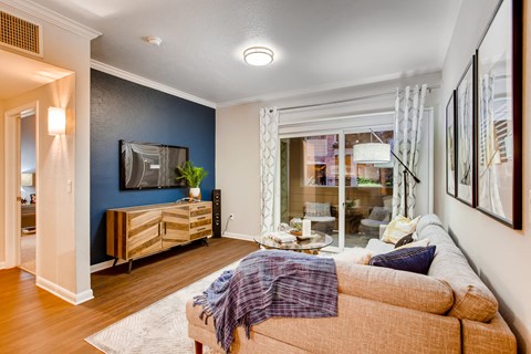 a living room with a couch and a tv